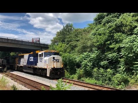 CSX 4568 Operation Lifesaver HU Leads A Mixed Freight Train Through