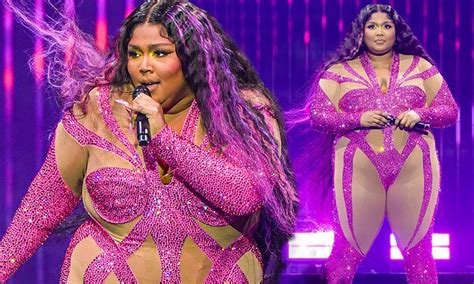 Lizzo Dons A Sparkly Pink Bodysuit As She Storms The Stage During Her