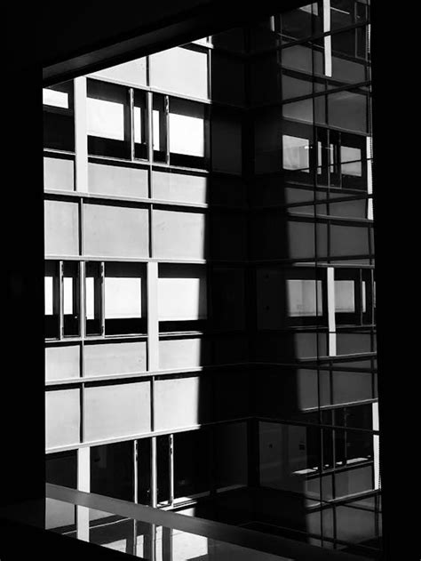 Black and White Photography of Glass Windows · Free Stock Photo