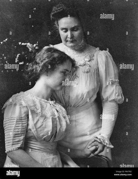 Helen Keller Three Quarter Length Seated Facing Right Holding Hand