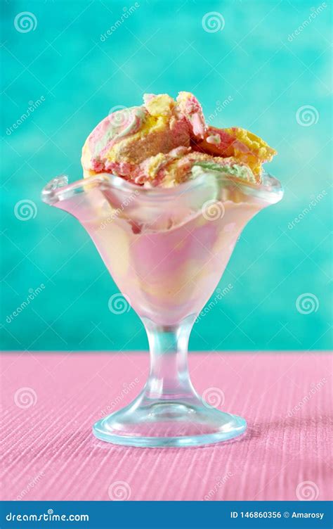 Rainbow Ice Cream In Sundae Glasses On Bright Colorful Background