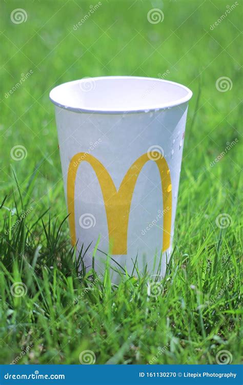 McDonald`s Drinks Cup on Vibrant Green Grass in Summer Time Editorial Image - Image of time ...