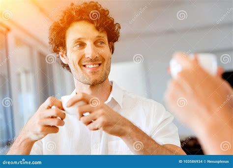 Man Having Tea At Home Stock Photo Image Of Confident 103586934