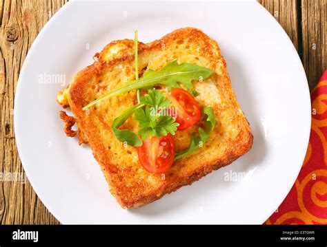 French Toast Bread Soaked In Beaten Eggs And Then Fried Stock Photo