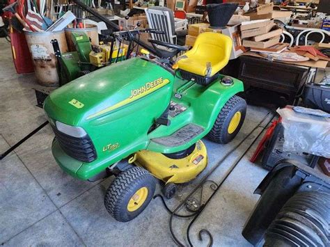 John Deere Lt150 Riding Lawn Mower W Bagger Adam Marshall Land And Auction Llc