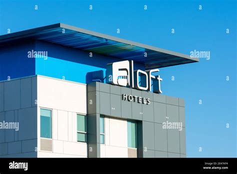 Aloft Hotels sign on the contemporary hotel building. Aloft Hotels is a ...