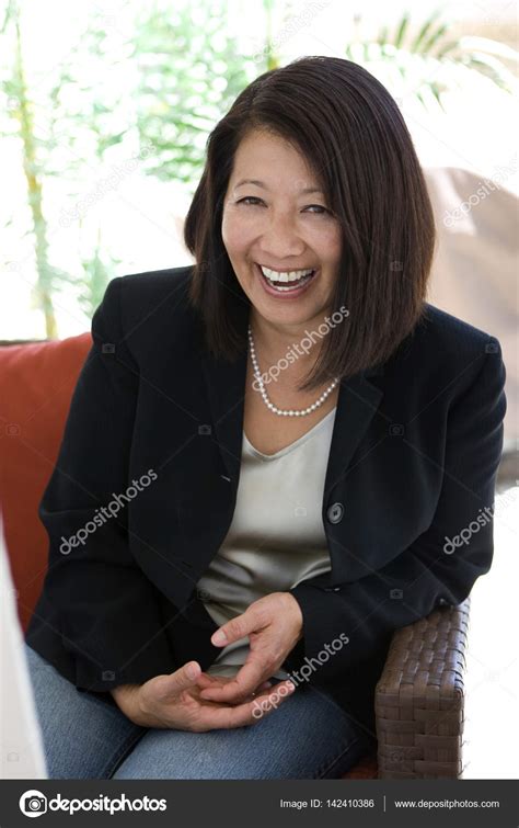Beautiful Mature Confident Asian Woman Smiling Stock Photo Image By
