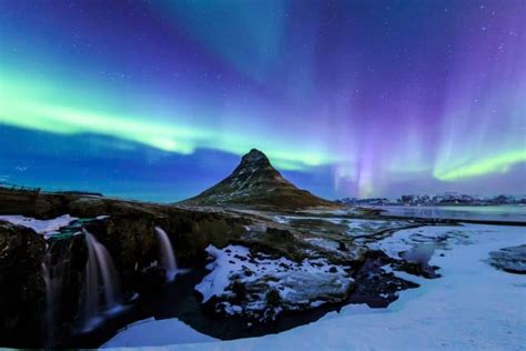 The Northern Lights make Kirkjufell mountain even more beautiful ...