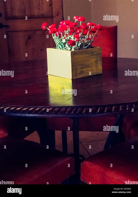 Flowers on table Stock Photo - Alamy