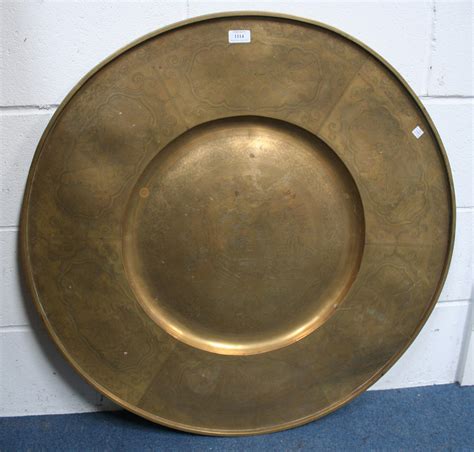 A Large Chinese Brass Circular Dish Probably Early Mid 20th Century The Centre Engraved With A Sce