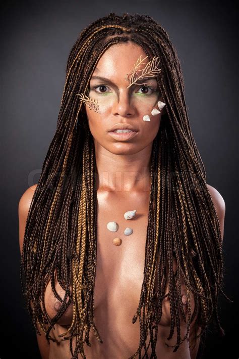 Portrait Of A Naked African American Woman With Dreadlocks Stock