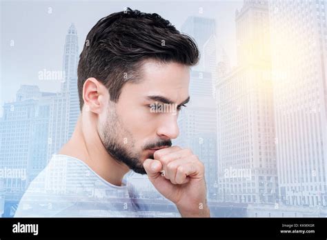 Attentive Brunette Man Being Deep In Thoughts Stock Photo Alamy