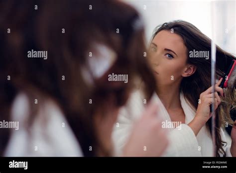 Beautiful Brunette Brush Her Hair Stock Photo Alamy