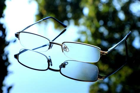 Reflective Photography of Black Framed Eyeglasses · Free Stock Photo
