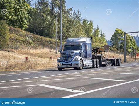 Stylish Blue Big Rig Bonnet Star Semi Truck Transporting Construction