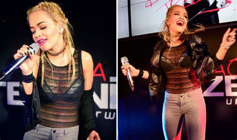 Rita Ora Flashes Bra In Boob Baring Netted Top At Store Opening
