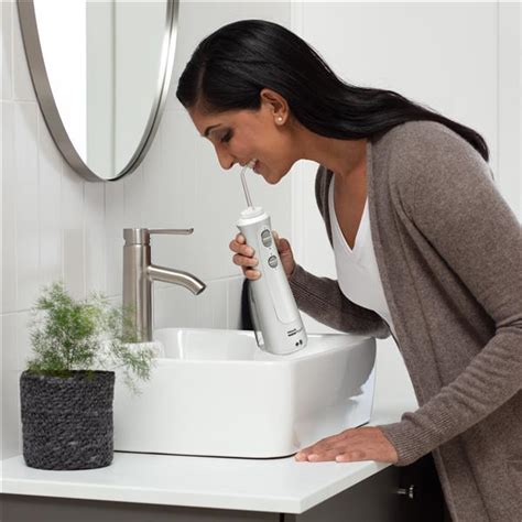 White Waterpik Ultra Plus And Cordless Pearl Combo