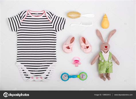 Baby care accessories and clothing — Stock Photo © belchonock #136833412