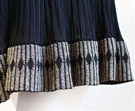 AZZEDINE ALAIA black mini dress with ruffled hemline For Sale at 1stDibs