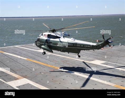 Marine One helicopter landing on the flight deck of Pre-Commissioning ...