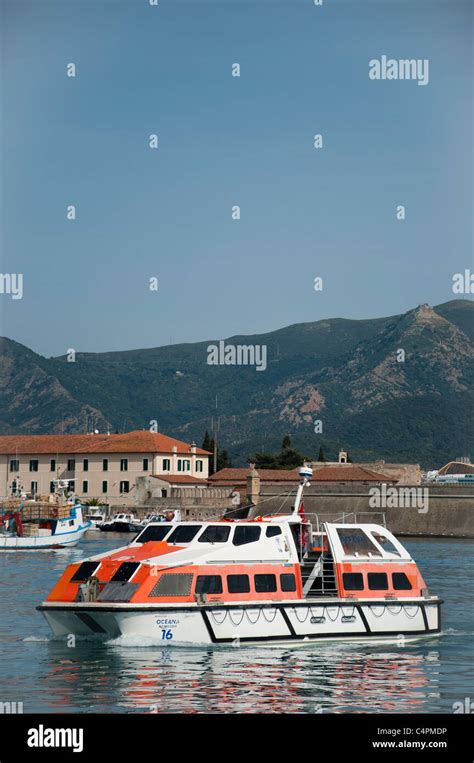 A Tender Boat Transporting Passengers From The Pando Cruise Ship Oceana To The Island Of Elba