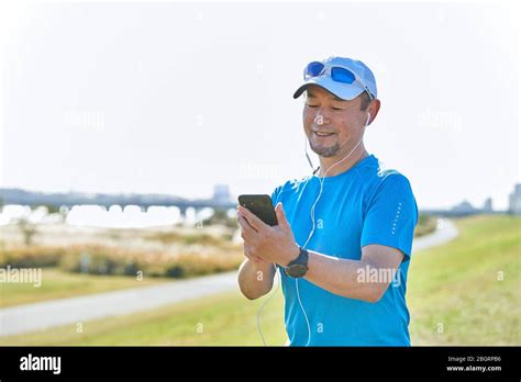 Mature Japanese Man Training Downtown Stock Photo Alamy