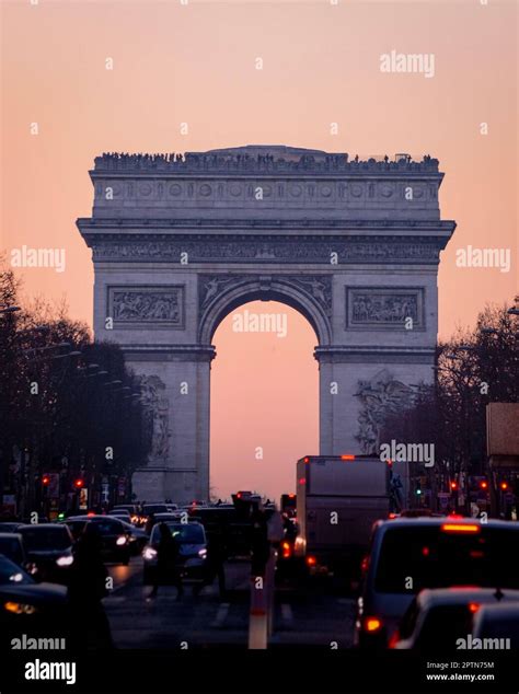 View Of Arc De Triomphe Over Sunset From Champs Elysees Stock Photo Alamy