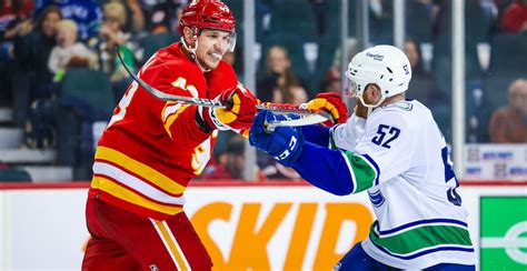 Flames score 10 goals on Canucks in preseason opener | Offside