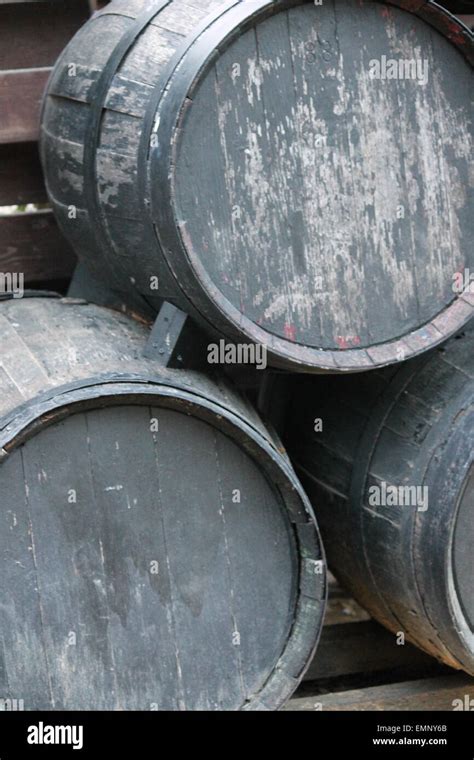 Wine Barrels Stacked In The Old Cellar Of The Winery Black And White