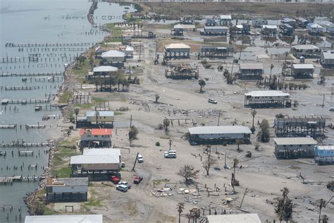 Louisiana Guard Shoring Up Levee Damaged By Hurricane Ida Article