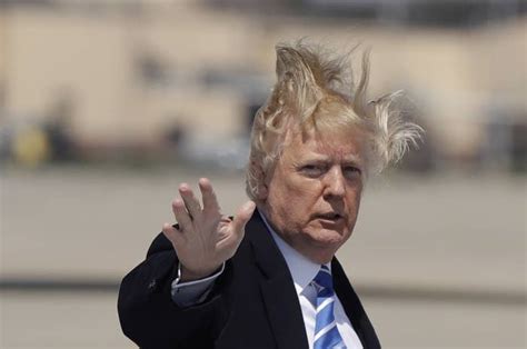 12 Photos Of Trump Boarding Air Force One On A Very Windy Day