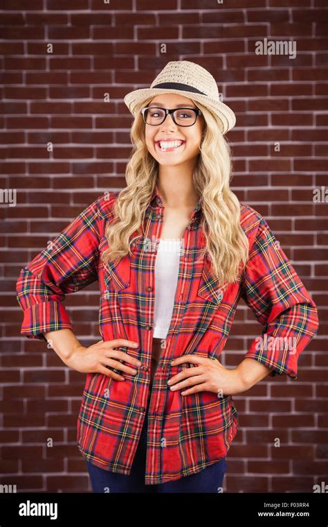 Gorgeous Smiling Blonde Hipster With Hands On Hips Stock Photo Alamy