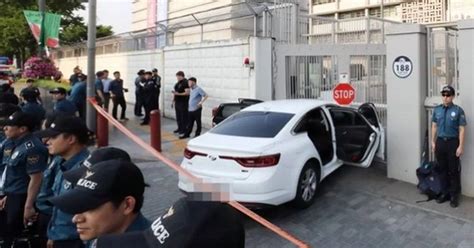 Car Loaded With Gas Canisters Rams Into Gates Of Us Embassy In Seoul