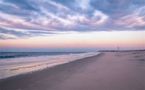 Cape May Nj Lighthouse Beach And Ocean In Violet Hues At Sunrise