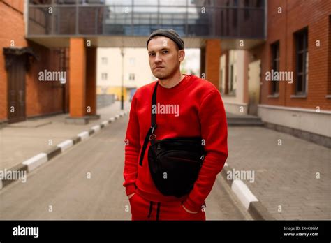 Man In Red Sweater And Black Fanny Pack Stock Photo Alamy