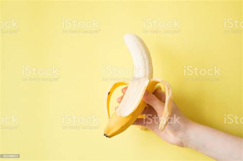 Human Hand Holding Banana Fruit Nutrition Concept Stock Photo