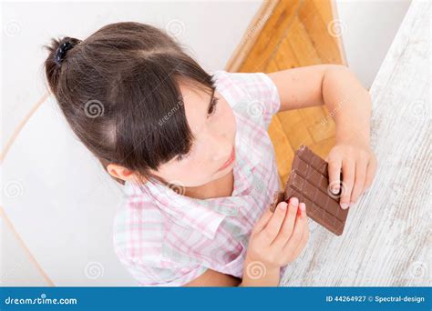 Daughter Eating Chocolate At Home Stock Image Image Of Chocolate