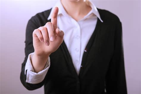 Premium Photo Business Woman Pointing Finger Isolated On Gay Background