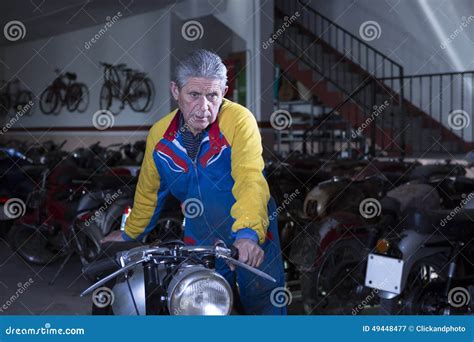 Middle Aged Man Placing A Motorbike Stock Image Image Of Vintage
