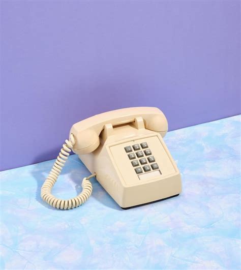 Premium Photo Beige Vintage Old Telephone With Gray Buttons On The