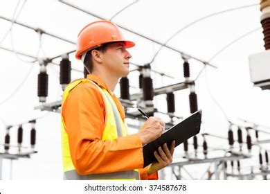 Male African Electrical Worker Substation Stock Photo