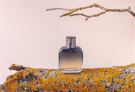 Premium Photo Perfume In A Spray Bottle Bark And Branches Of A Tree