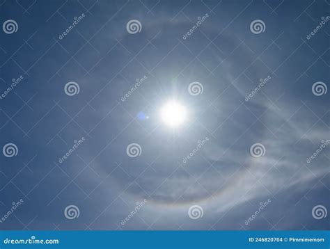 Optical Phenomenon Called 22 Degree Halo Around The Sun Stock Photo