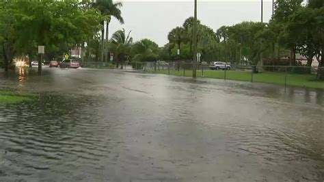 Public Works Crews Pump Water Out In Flooded Areas Of Coral Springs