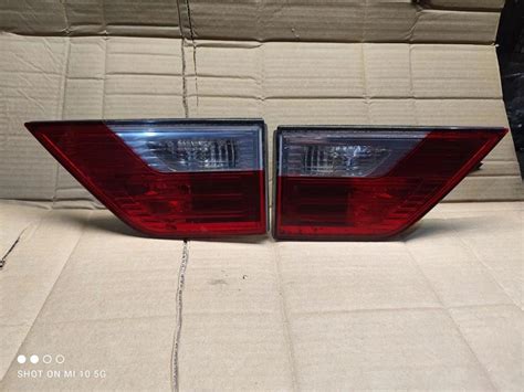 BMW X3 E83 LIFT LCI LAMPA LEWA PRAWA TYŁ TYLNA W KLAPĘ 7162214 7162213