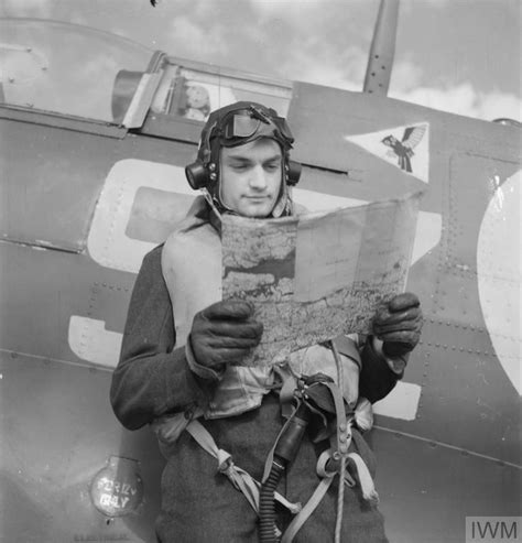 A Fighter Pilot Checks His Maps Fighter Pilot Wwii Fighter Pilot Wwii Fighters