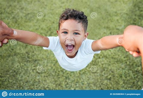 Lets Do It One More Time A Little Boy Having Fun At The Park Stock