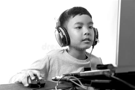 Asian Kid Play Computer Games (black and White) Stock Photo - Image of ...