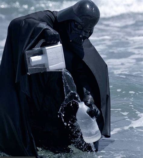 Darth Vader In The Sea Pouring Water From A Water Filter Into Bottle