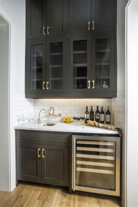 Black Wet Bar Wine Fridge White Subway Tile Backsplash Black Cabinets With Brass Hardware